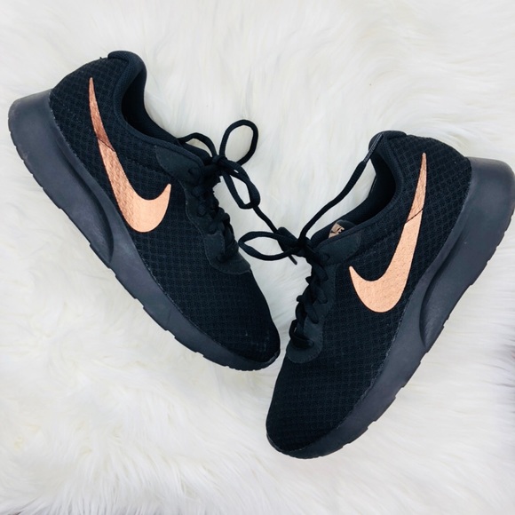 rose gold and black nike shoes